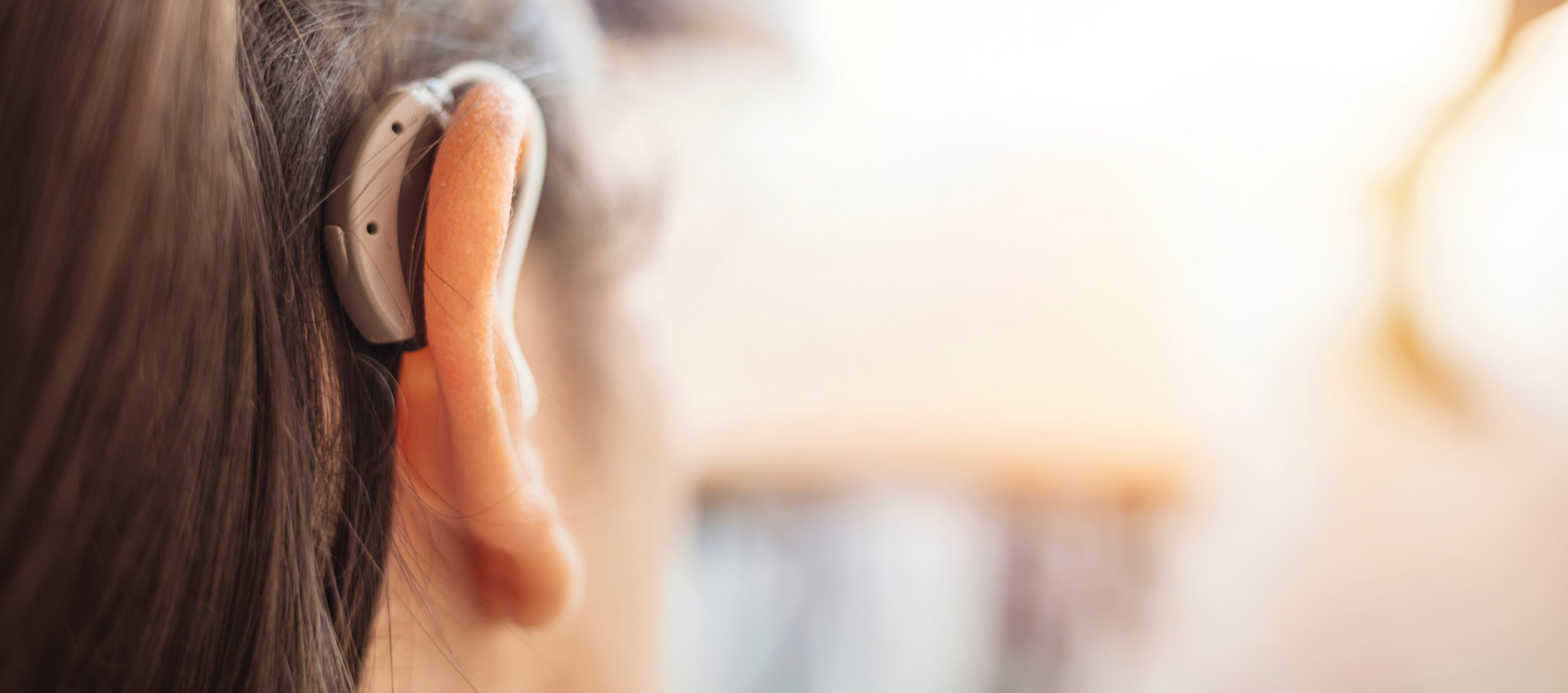 woman wearing hearing aid