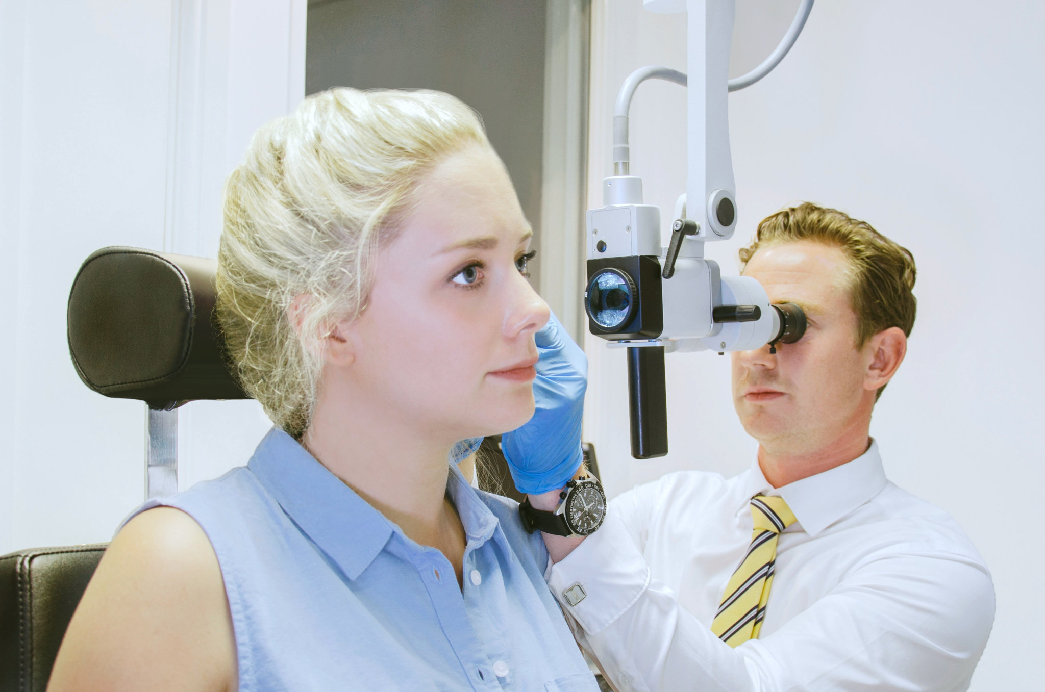 woman having ear wax removed