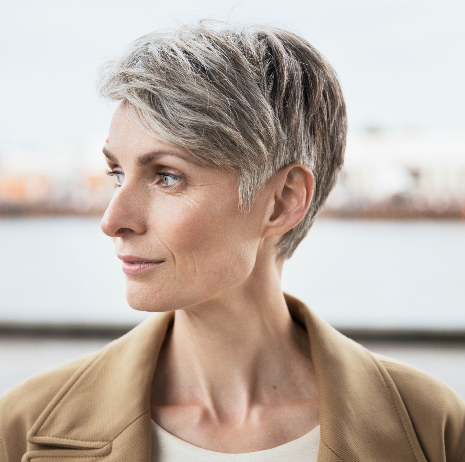 woman wearing invisible hearing aids 