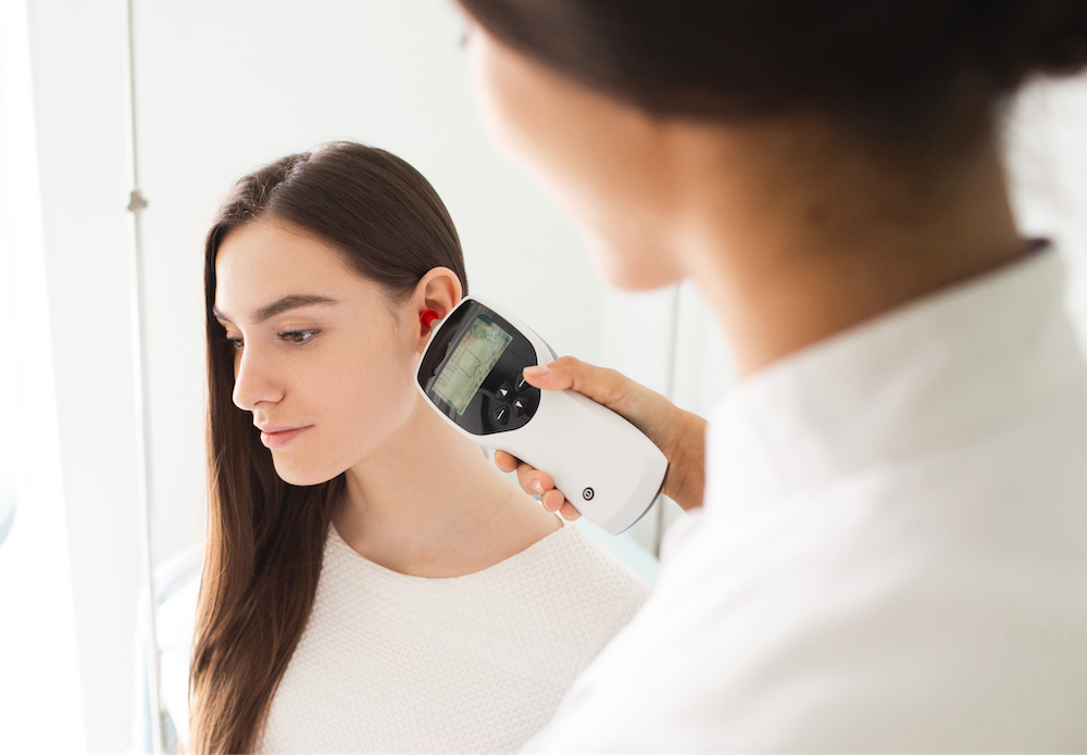 woman having hearing test